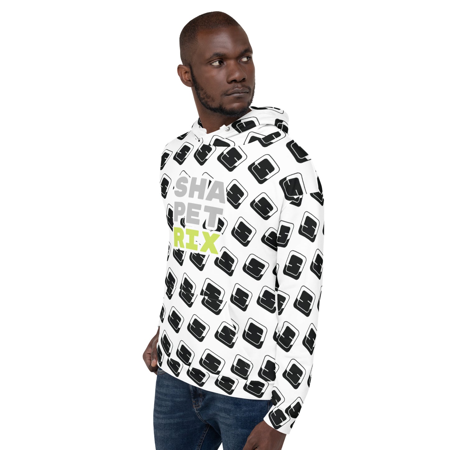 This image features a young African American man wearing a white hoodie patterned with an all-over black Shapetrix 'S' logo design. The hoodie showcases the Shapetrix brand name in lime green text on the left side of the chest. He is turned slightly to the side, giving a serious and thoughtful expression to the camera. The clean lines of the hoodie, combined with its bold, repeating logo pattern, offer a modern and stylish appearance.