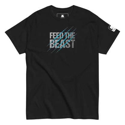 Black t-shirt with a graphic design featuring the phrase 'FEED THE BEAST' in large, distressed white and blue text, overlaid with diagonal blue scratch marks.