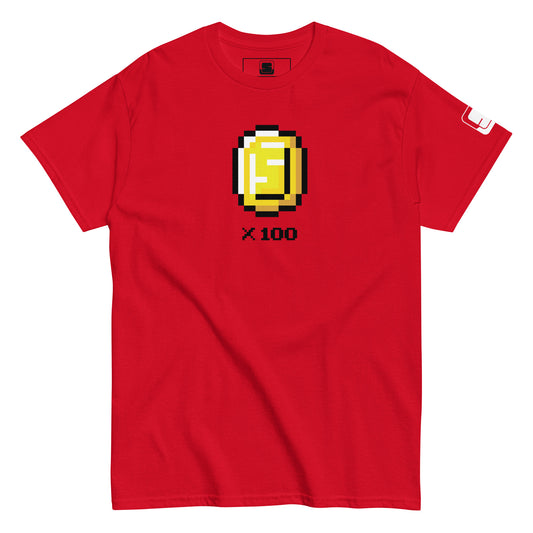  A bold red t-shirt featuring a pixel art style golden coin with the letter 'S' in the center and the text "x 100" below. The vibrant red color of the shirt makes the yellow and white pixel design pop, offering a striking visual contrast. The shirt also sports a small logo on the sleeve, enhancing its trendy and eye-catching appeal.