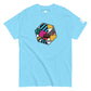 A light blue tee shirt featuring a modern, geometric art design in the center. The design includes an abstract, six-sided shape filled with various patterns in teal, black, pink, yellow, and white. This vibrant and colorful pattern stands out against the plain blue background of the shirt, making it eye-catching and stylish.
