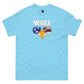 A light blue t-shirt displayed flat, adorned with a humorous and patriotic graphic. The shirt features the phrase "'MERICA" in large, uppercase letters, with a stylized eagle's beak depicted below it. The beak is designed with aviator sunglasses that reflect American symbolism: the left lens has a blue background with white stars, and the right lens showcases red and white stripes, mimicking the American flag. This spirited design emphasizes American pride in a lighthearted manner.