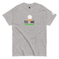  Grey short-sleeved t-shirt with a 'Tee Time' graphic showing a golf ball character on grass on the chest and a small logo patch on the sleeve, against a white background.