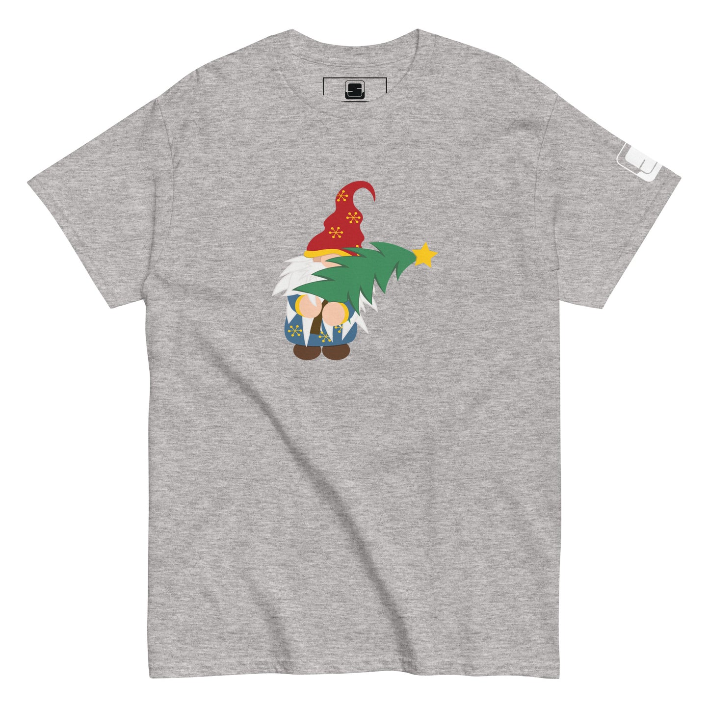 A light gray t-shirt featuring a playful gnome design. The gnome is adorned with a red hat embellished with golden snowflakes, a white beard, and is depicted carrying a green Christmas tree decorated with a yellow star on top. The t-shirt is casually styled with a small logo tag on the sleeve.