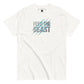 White t-shirt with a graphic design featuring the phrase 'FEED THE BEAST' in large, distressed white and blue text, overlaid with diagonal blue scratch marks.