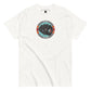 A plain white t-shirt features a centered circular design resembling a poker chip in red, teal, and gray colors. The design displays the royal flush hand in spades, with the ace prominently visible, labeled "ROYAL FLUSH" at the top. The shirt's straightforward and clean appearance highlights the poker theme, making it a suitable choice for casual wear or themed events.