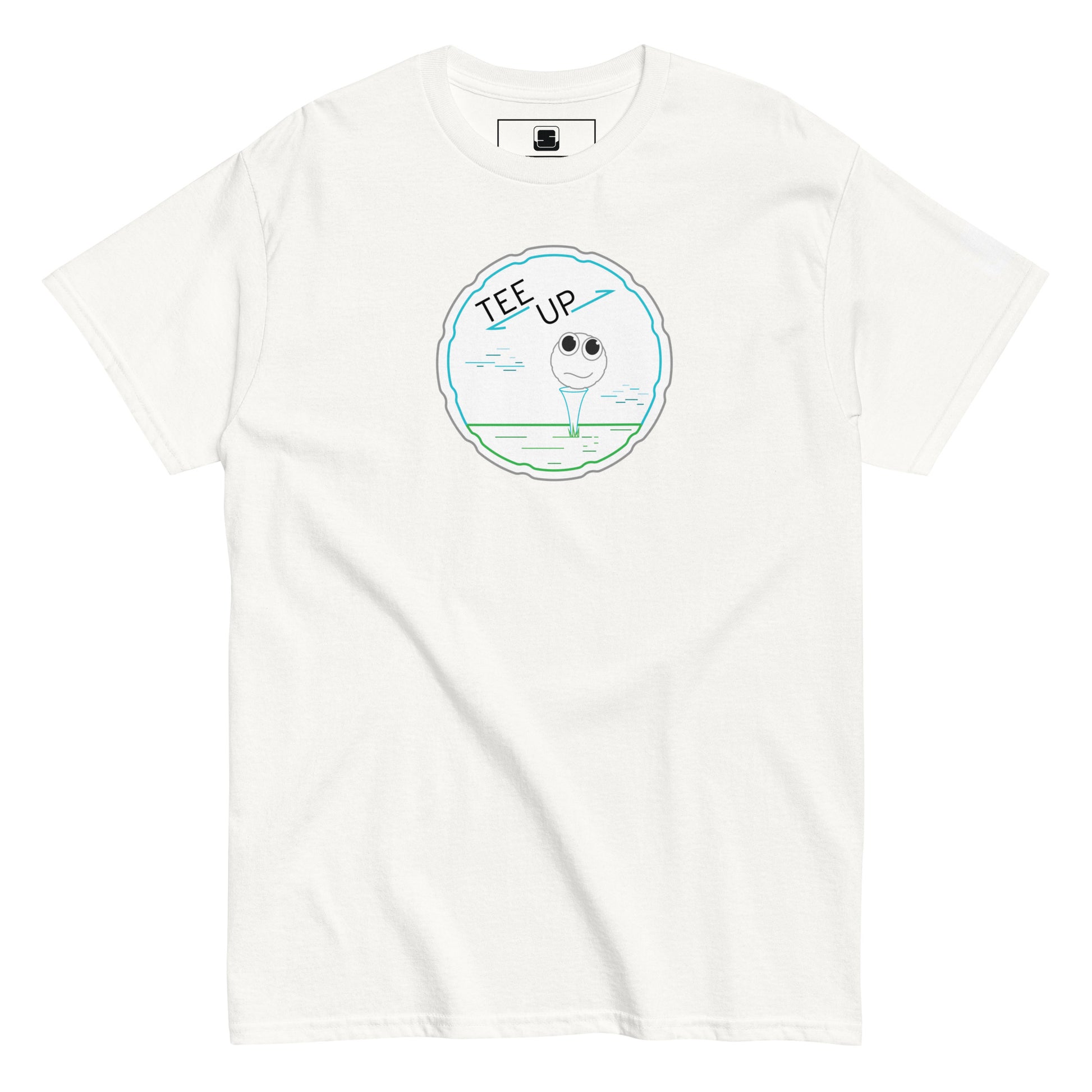 A white t-shirt is displayed flat, showcasing a playful golf-themed graphic in the center. The design features a cheerful golf ball character perched atop a tee, encircled by a light blue outline that resembles a golf hole. Above the golf ball, the phrase "TEE UP" is written in a fun, casual font, emphasizing the golfing motif. The simple yet charming design offers a humorous take on golfing attire, perfect for casual wear.