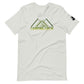 A light gray t-shirt showcases a striking 'CAMPING CREW' logo across the chest in a green to yellow  gradient. The text is creatively integrated with abstract mountain peaks, enhancing the outdoor adventure theme of the shirt. This design is perfect for nature enthusiasts who enjoy expressing their love for camping.