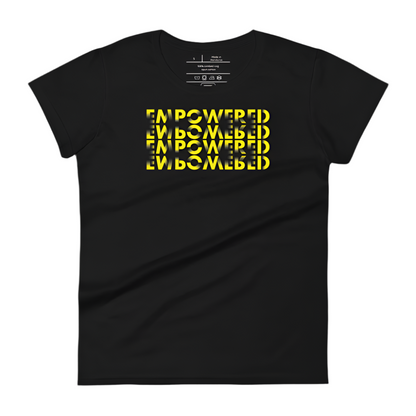 black t-shirt displays a bold graphic design where the word "EMPOWERED" is repeated four times in a golden yellow color. The text is cleverly arranged to create a visual effect that resembles a three-dimensional cube, enhancing the impact of the message. This artistic rendering combines both the empowerment theme and a visually appealing geometric pattern, set against the dark fabric to make the design pop.